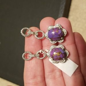 Sterling silver earrings with purple stones